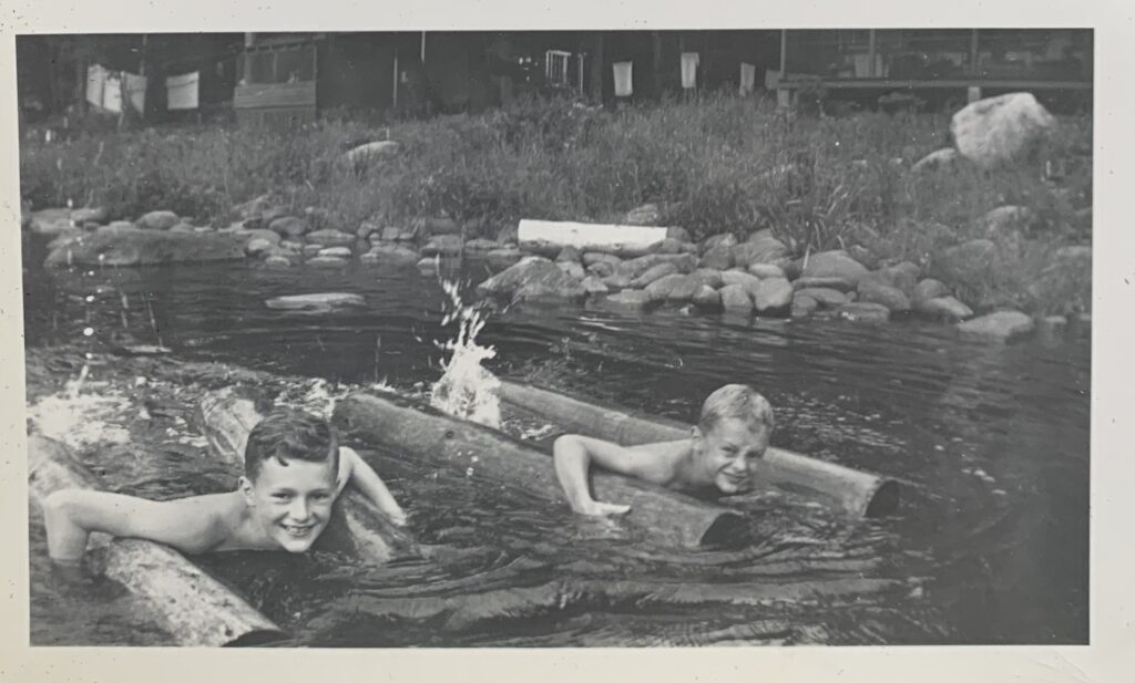 Jim and John floating with the logs in the Hudson River